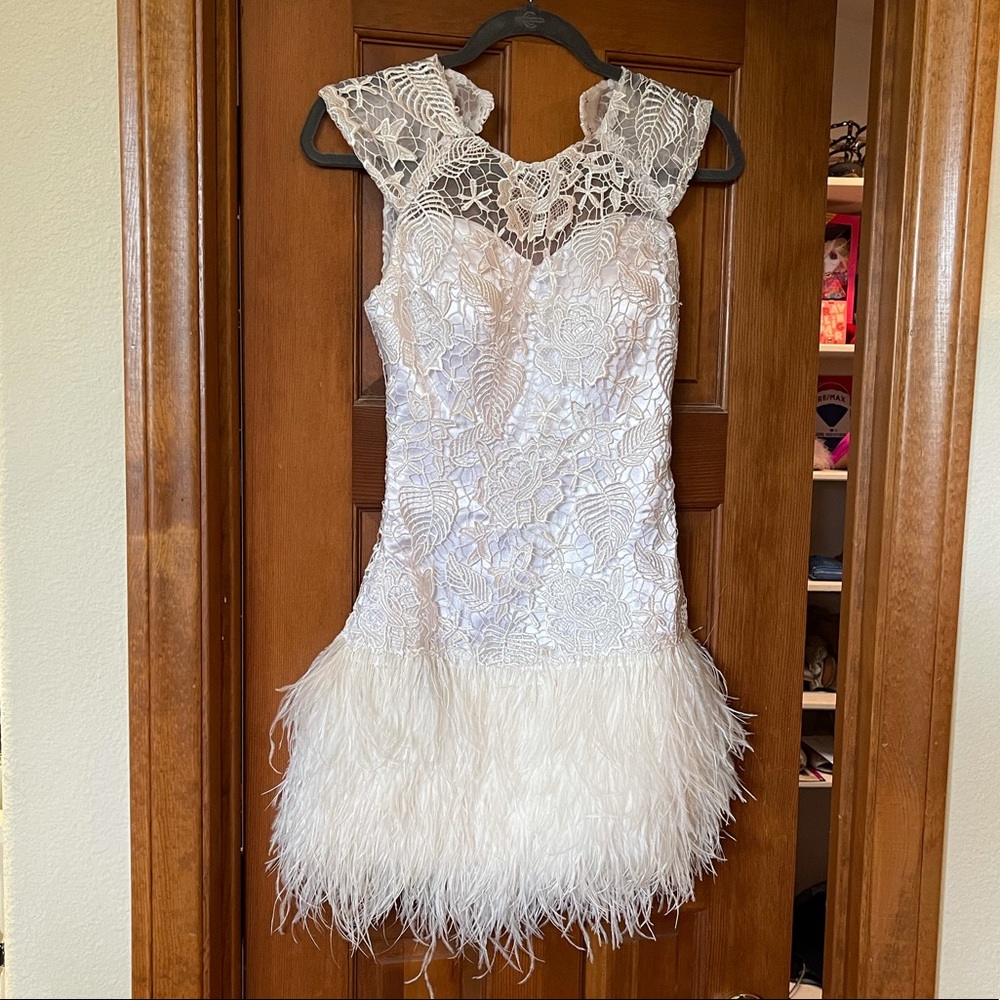 Ostrich feather white dress- great for brides!